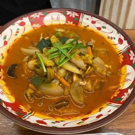 Hot spicy noodle soup with vegetables for rainy day food Ho Chi Minh
